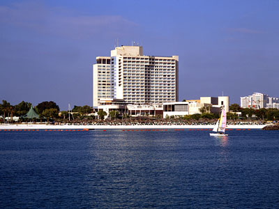  View of hotel & beach with sailboat